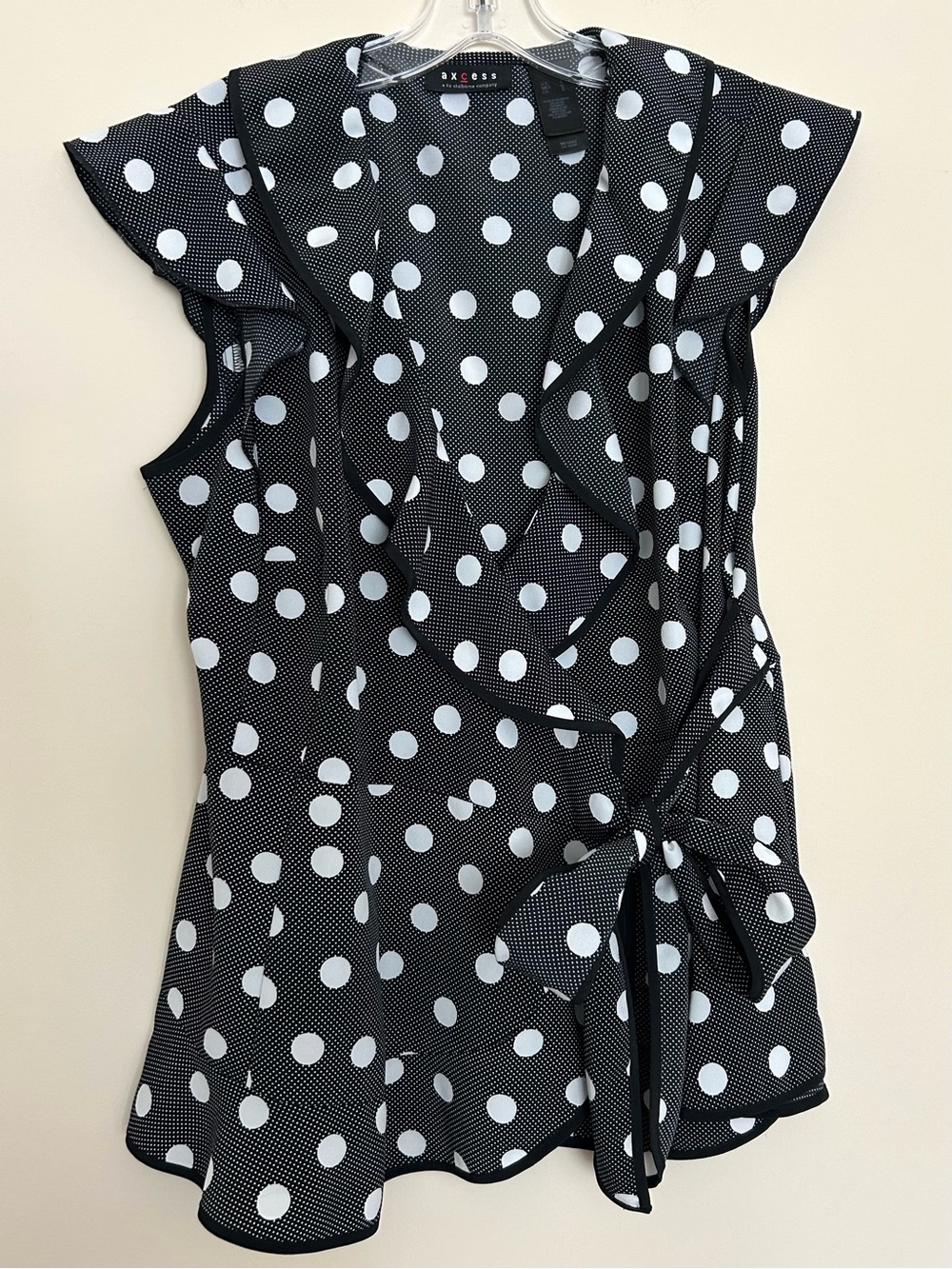 Axcess Women’s Black and White Polka Dot Ruffle Side-Tie Sleeveless Blouse